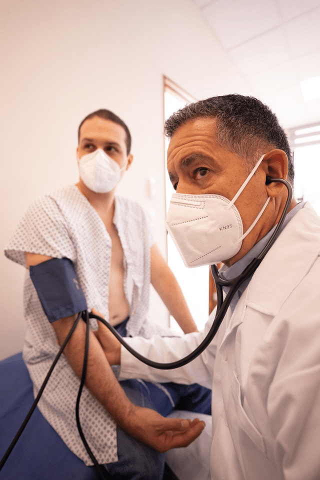 talking with a doctor about preexisting conditions