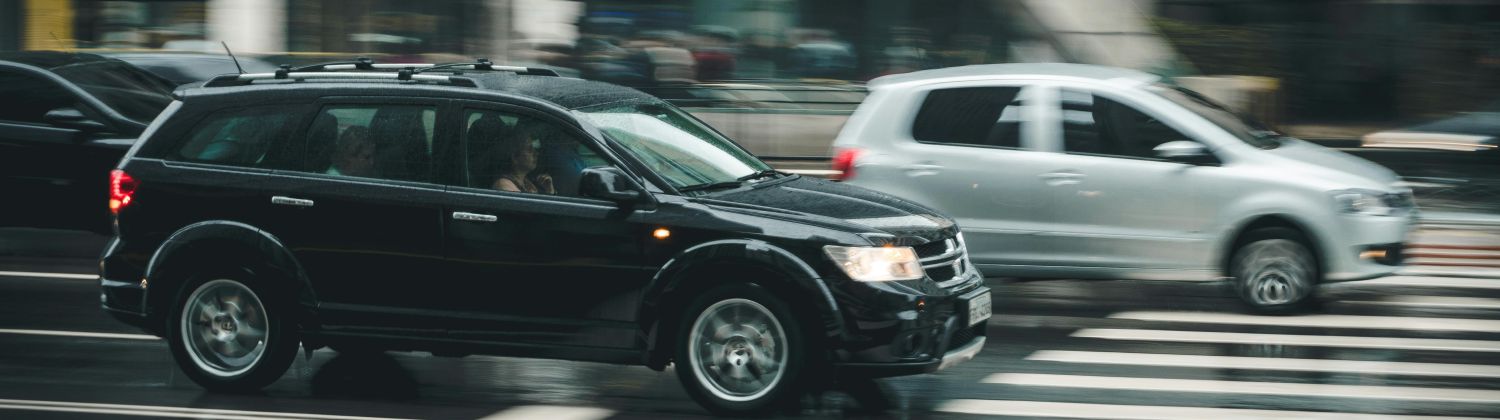 A car races through in intersection