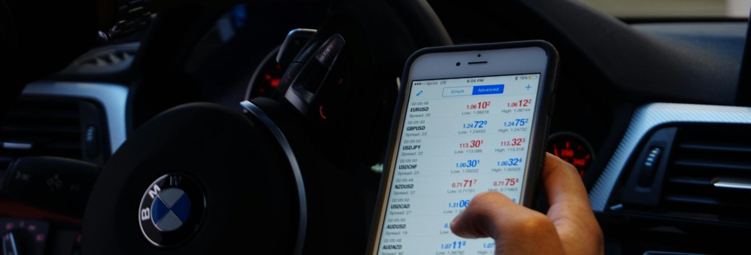 A driver looks at their cellphone while driving.