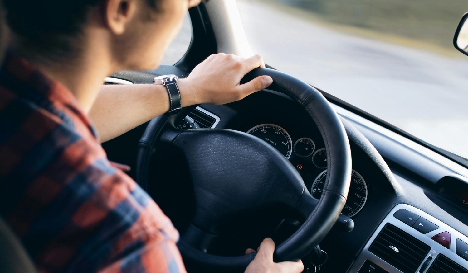An impaired man drives a car