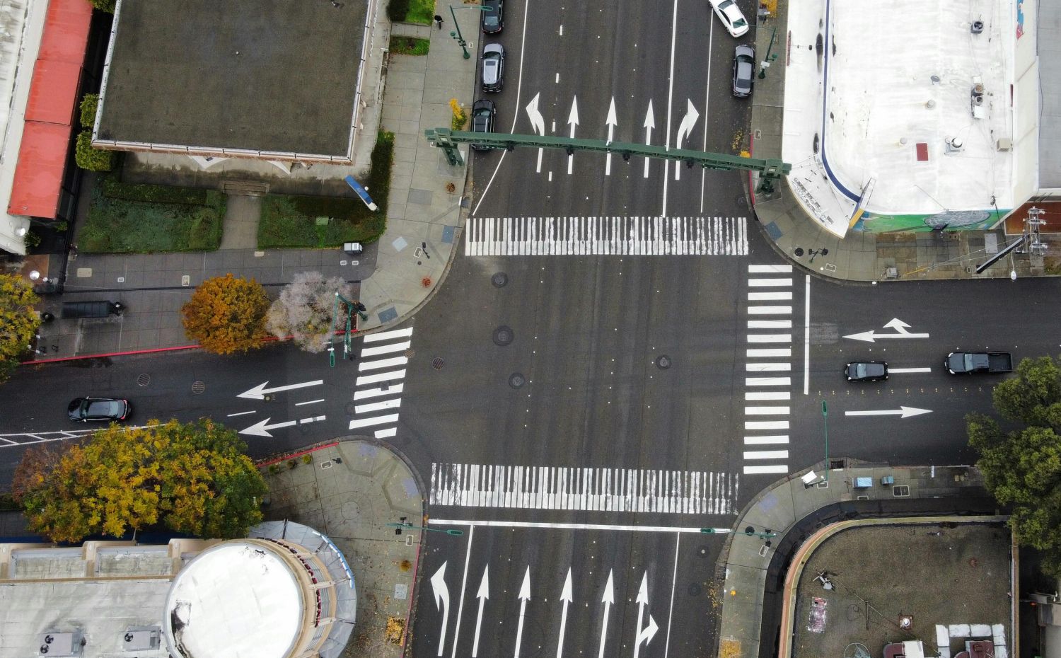 Cars travel through an intersection