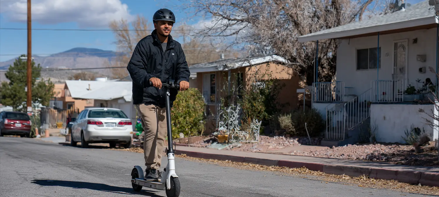 An e-scooter rider carries extra insurance